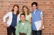 Photo: Teenagers (14-16) standing side by side, smiling, portrait Teenagers (14-16) standing side by side, smiling, portrait