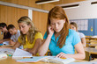 Photo: High school students giving an exam in a classroom High school students giving an exam in a classroom