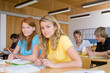High school students giving an exam in a classroom