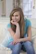 Foto: Teenage girl relaxing at home Teenage girl relaxing at home