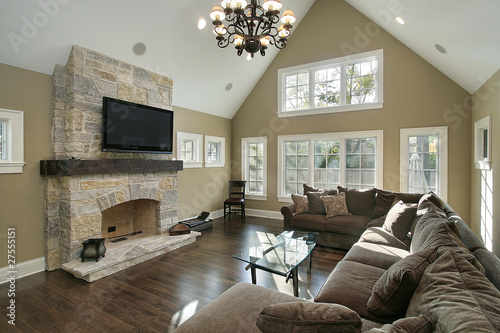 Photo: Family room with stone fireplace Family room with stone fireplace