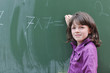 happy school girl on math classes