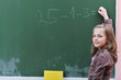 happy school girl on math classes