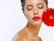 Beautiful woman face with a flower Beautiful woman face with a flower