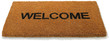 Welcome front door mat on a white background
