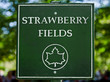 The sign along the path at Strawberry Fields in New York