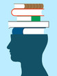 Male head silhouette with stack of books - education