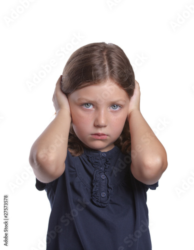 Photo: Little Girl Covering Ears Little Girl Covering Ears