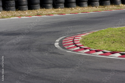 Photo: Empty tarmac race track corner Empty tarmac race track corner