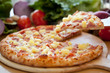 Hawaiian Pizza lifted slice 2