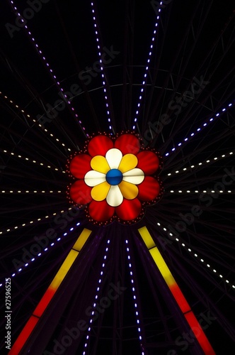 Photo: Neon flower in the amusement park by night Neon flower in the amusement park by night