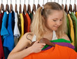 Girl choosing clothes in a store