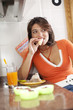 Woman eating her breakfast