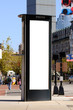 Tall Billboard on Telephone Booth