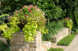 Photo en ligne au meilleur prix Planters on Stone Wall Framing House Entrance