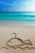 a picture on sand- whale