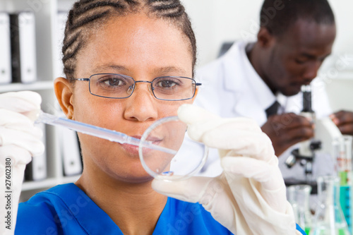 Photo: african american science students doing experiments african american science students doing experiments