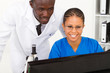 african science teacher helping student