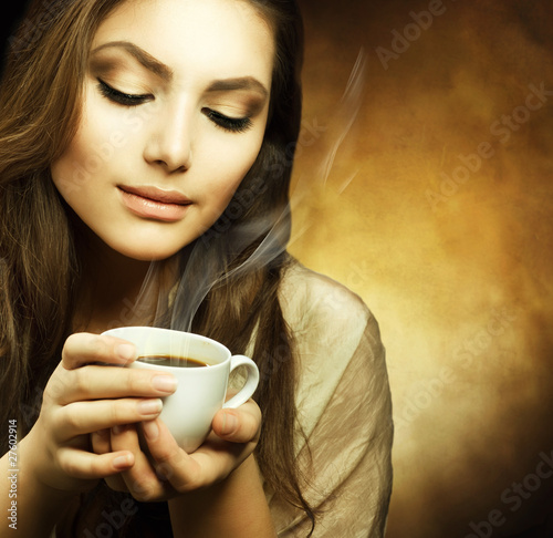 Beautiful Woman with cup of Coffee