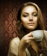 Beautiful Woman with cup of Coffee
