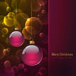 colorful cristmas card with baubles and warm blurred lights