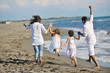 happy young  family have fun on beach