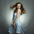 Fashion portrait of the young dancing woman