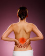 Woman massaging pain back