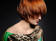Beautiful red heaired woman portrait with fashion hairstyle from