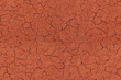 Cracked red textured surface seamlessly tileable Cracked red textured surface seamlessly tileable