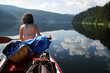 Canoeing girl on a lake