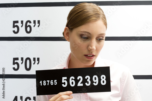 Photo: Young woman mugshot Young woman mugshot