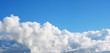 Blue sky puffy cloud