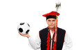 Polish man in a traditional outfit with football Polish man in a traditional outfit with football