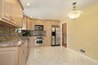 Kitchen with oak wood cabinetry