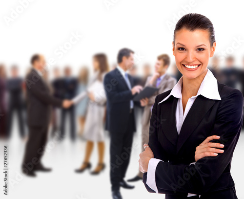 Foto: Female Business leader standing in front of her team Female Business leader standing in front of her team