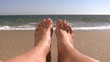 Feet on sandy beach - HD