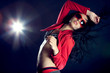 Portrait of a beautiful dancing girl on dark background Portrait of a beautiful dancing girl on dark background