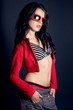 Sexy girl portrait on dark background with sunglasses Sexy girl portrait on dark background with sunglasses
