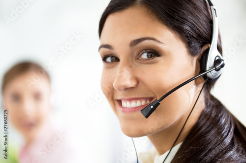 Photo: Woman with a headset Woman with a headset
