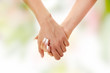 Two woman holding hands Two woman holding hands