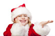 Foto: Mädchen als Christkind hält offene Handfläche für Werbung Mädchen als Christkind hält offene Handfläche für Werbung