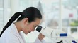 Video: Female Researcher at a Microscope Female Researcher at a Microscope