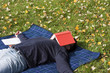 Foto: Young Adult Relaxing in the Park Young Adult Relaxing in the Park