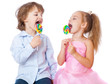 Boy and girl with lollipops Boy and girl with lollipops