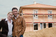 couple infront of new house