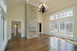 Living Room With Two Story Fir...