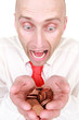 Businessman with pile of coins