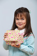 Cute girl opening gift box