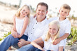 Handsome Dad and His Cute Children at The Beach